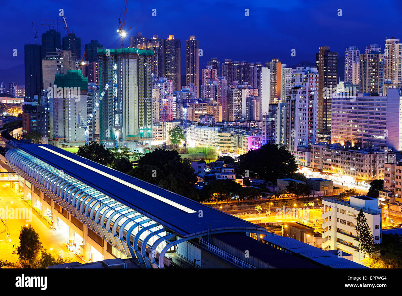 Long Ping, hong kong urban downtown and high speed train at night Stock ...