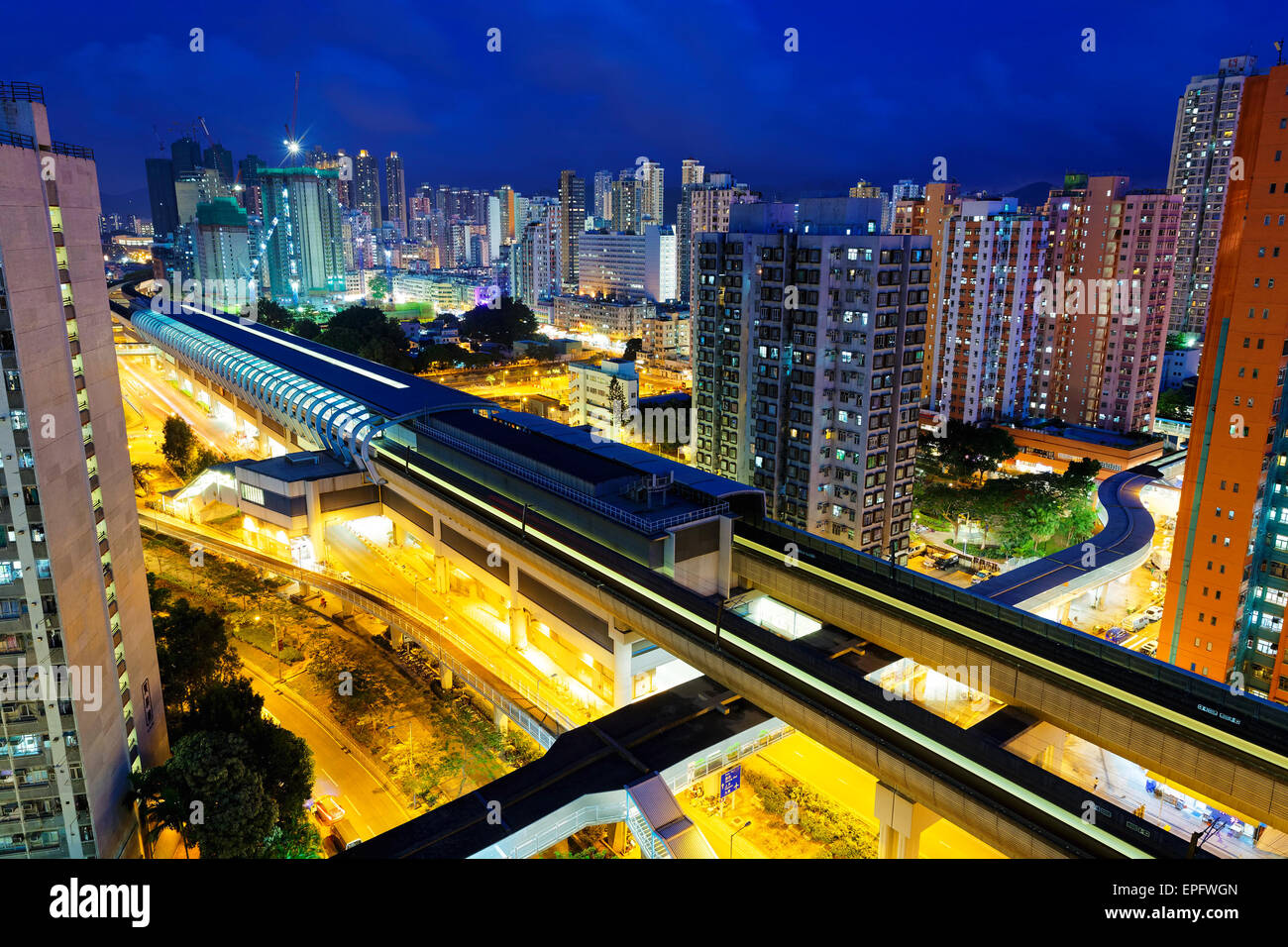 Long Ping, Hong Kong Urban Downtown And High Speed Train At Night Stock 