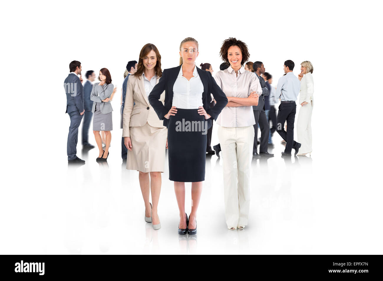 Composite image of team of businesswomen looking at camera Stock Photo ...