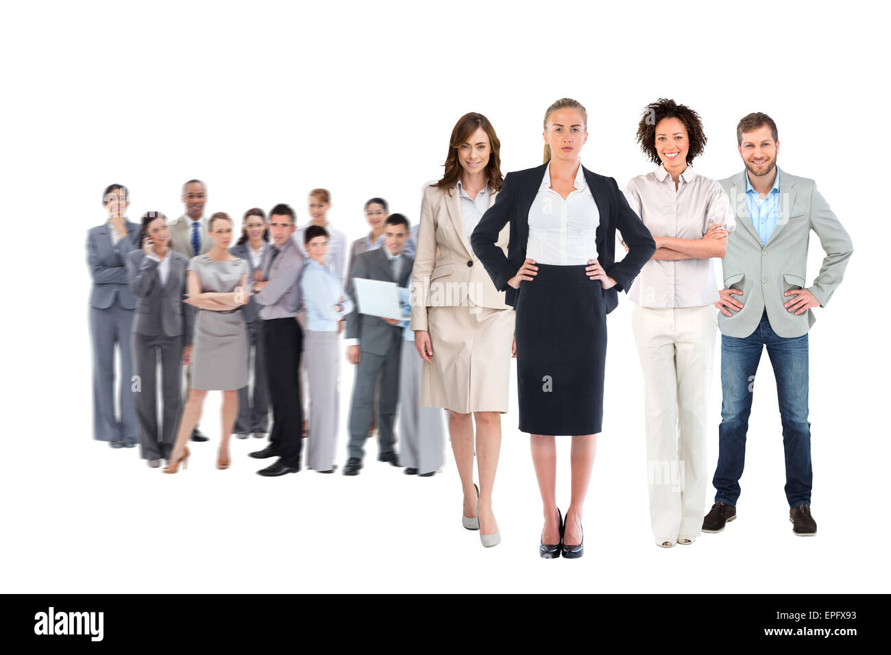 Composite image of business team looking at camera Stock Photo - Alamy