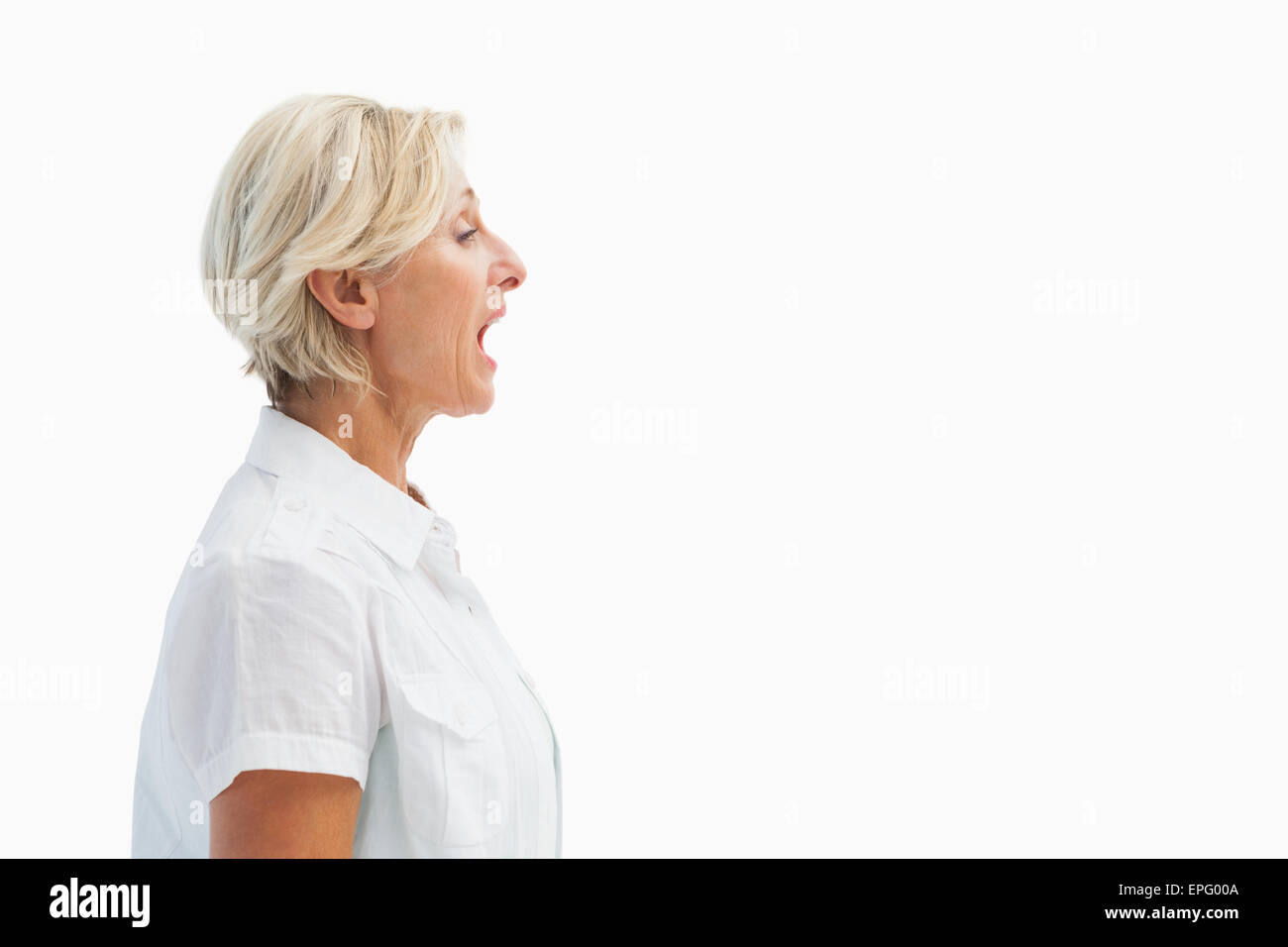 Happy mature woman talking loudly Stock Photo