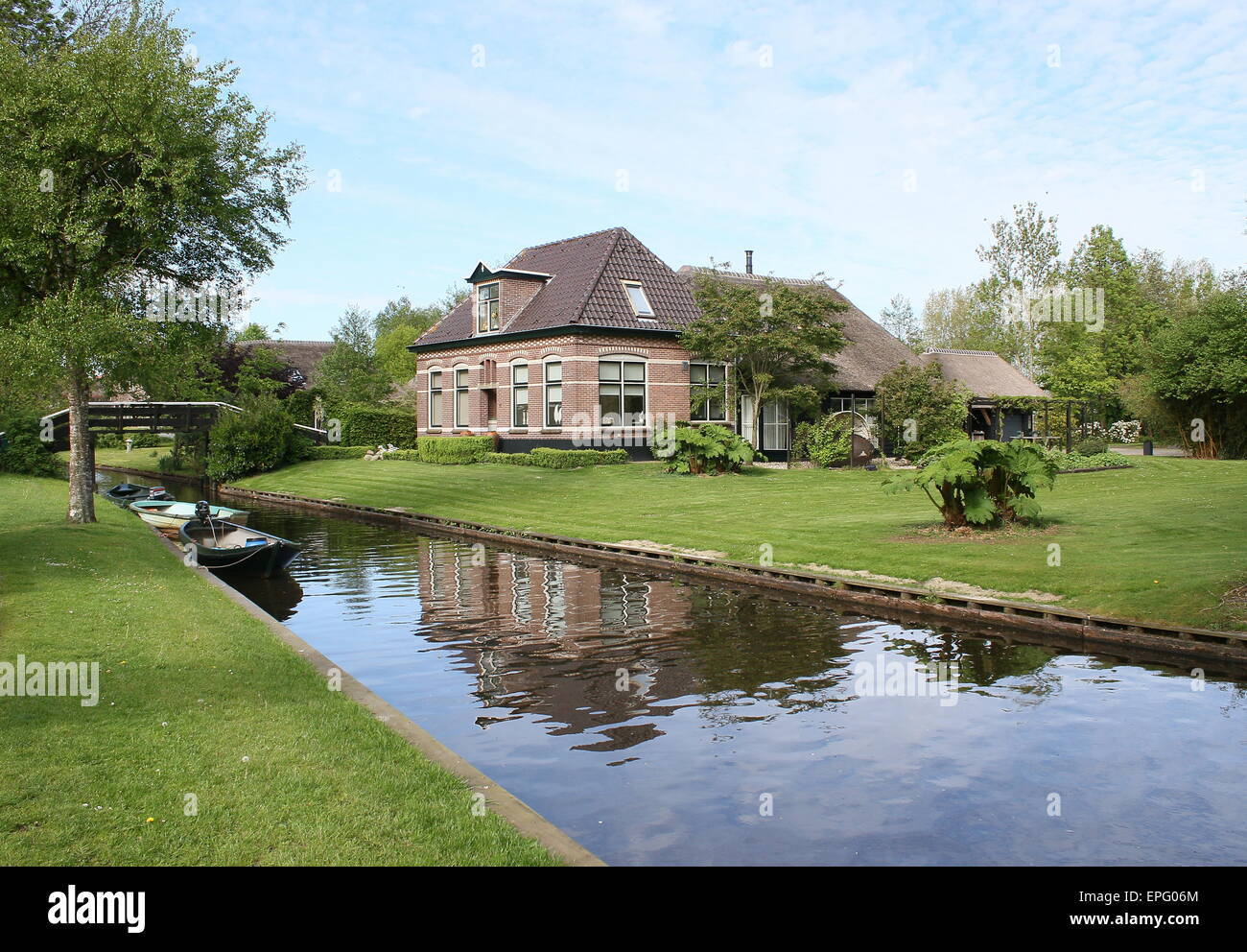 House along the canal in the e popular tourist village of Giethoorn, Overijssel, The Netherlands Stock Photo