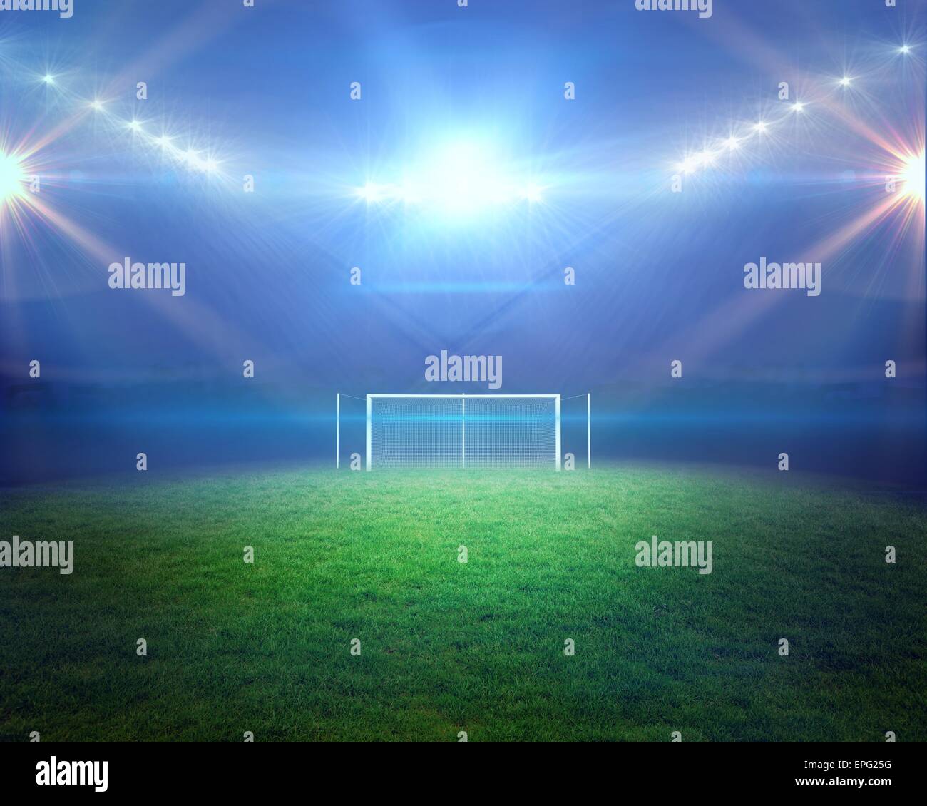 Football pitch with lights and goalpost Stock Photo Alamy