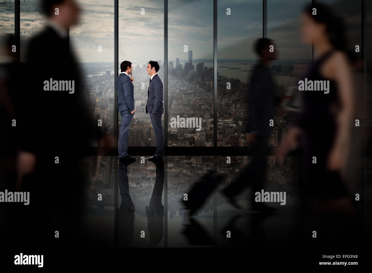 Composite image of businessmen talking Stock Photo - Alamy