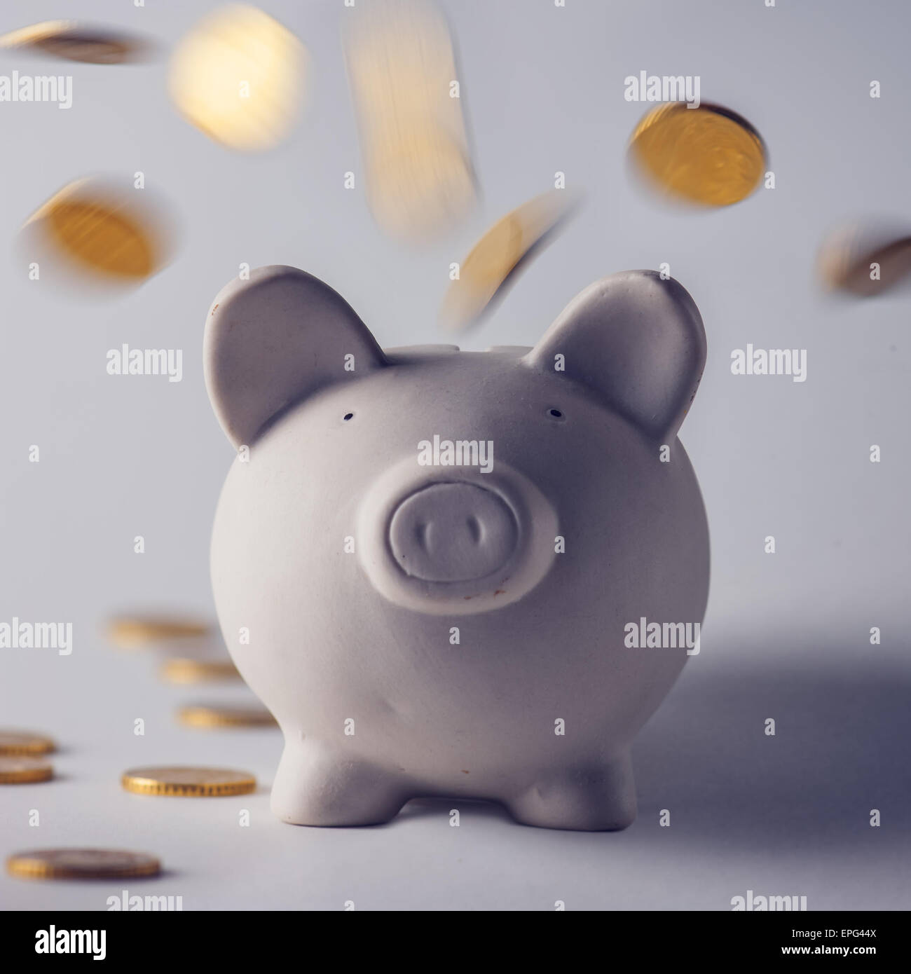 pig money box with golden coins Stock Photo