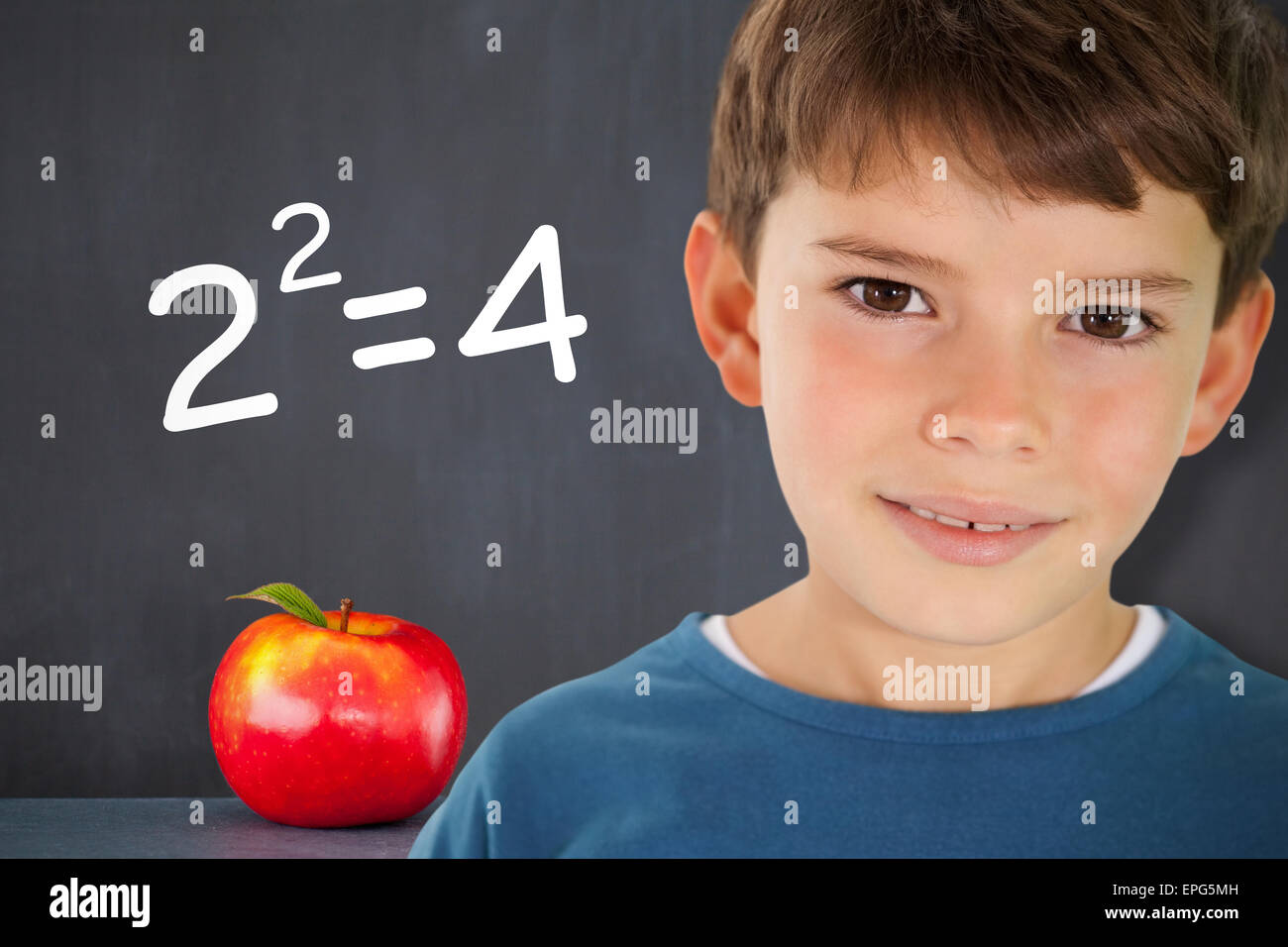 Composite image of cute boy smiling Stock Photo - Alamy