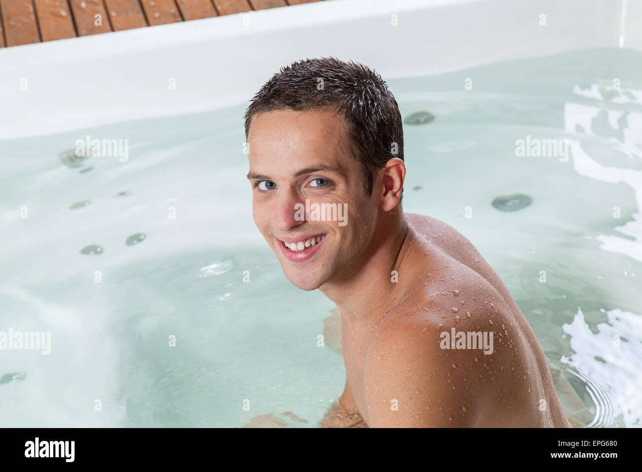 Man inside the jacuzzi Stock Photo Alamy