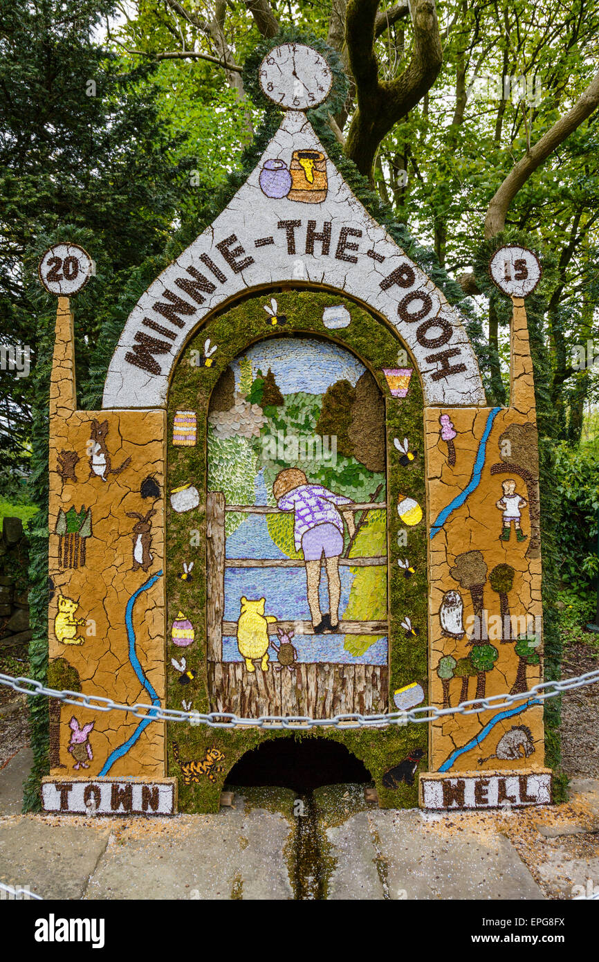 Tissington Well Dressing 2015 - a well dressing with a Winnie the Pooh motif, Peak District, Derbyshire. Stock Photo