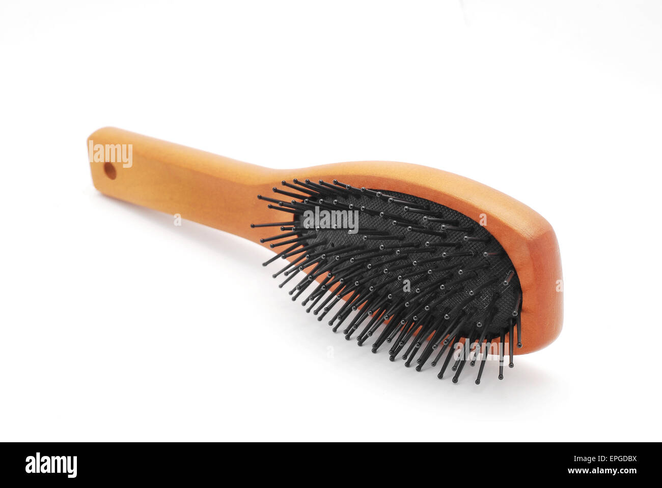 wooden hair brush on white background Stock Photo