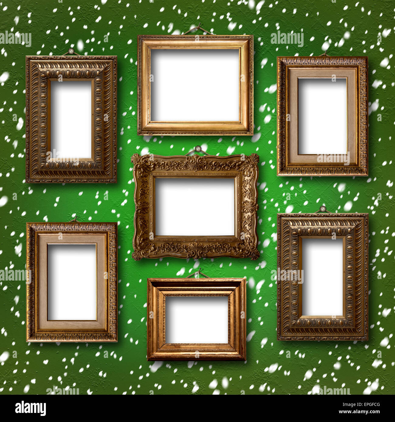 Gilded wooden frames for pictures on abstract blue background Stock Photo