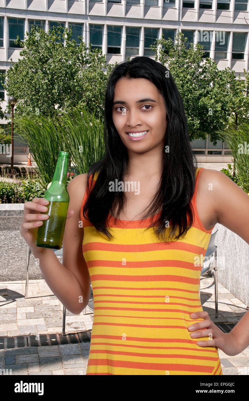 Woman drinking beer Stock Photo