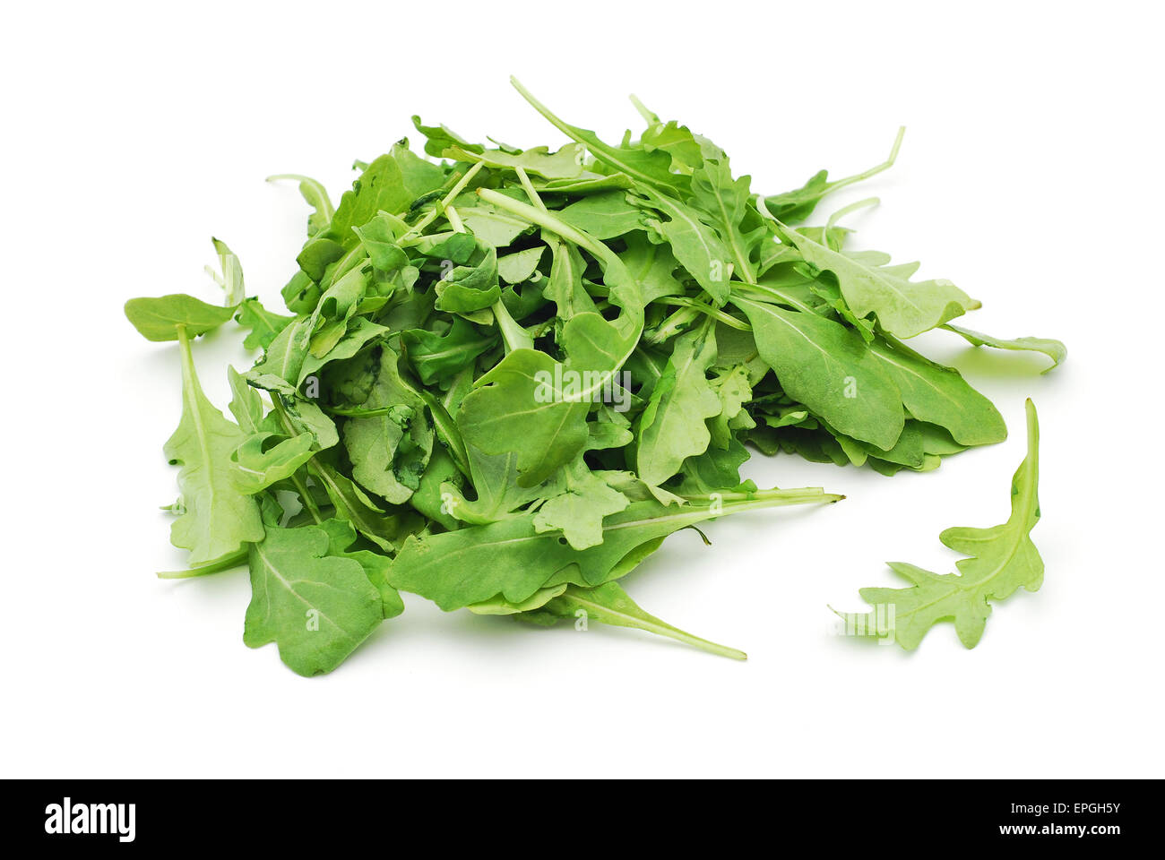 rucola leaves on white background Stock Photo