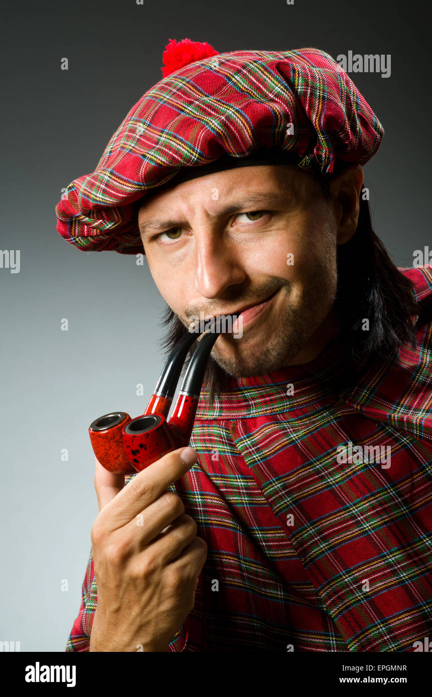 Funny scotsman with smoking pipe Stock Photo Alamy