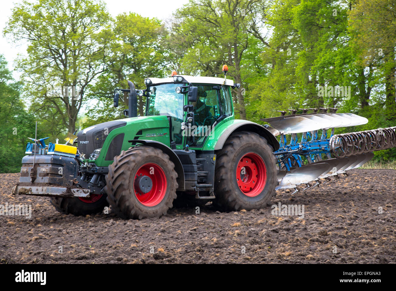 Tractor and plow in field hi-res stock photography and images - Alamy