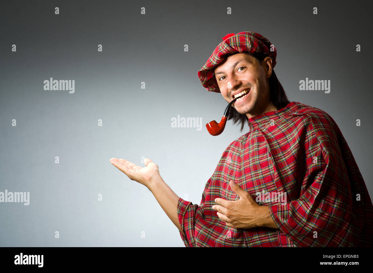 Funny scotsman with smoking pipe Stock Photo Alamy