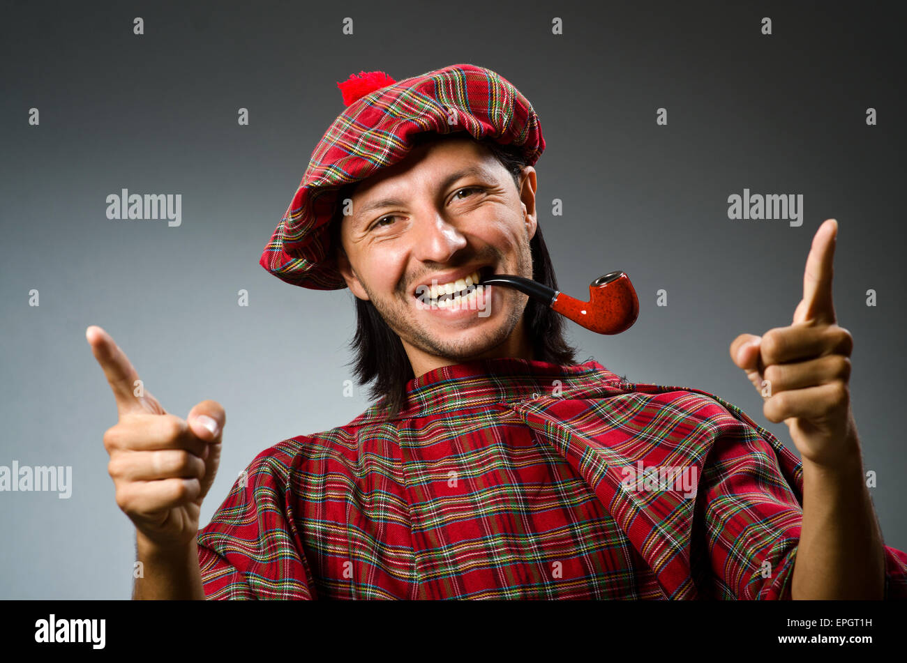 Funny scotsman with smoking pipe Stock Photo Alamy