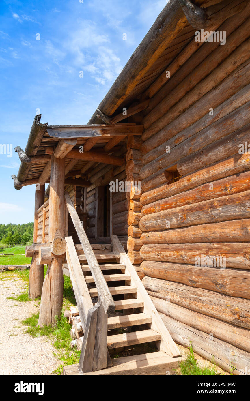 Russian rural wooden architecture example, old house fragment with stairway Stock Photo