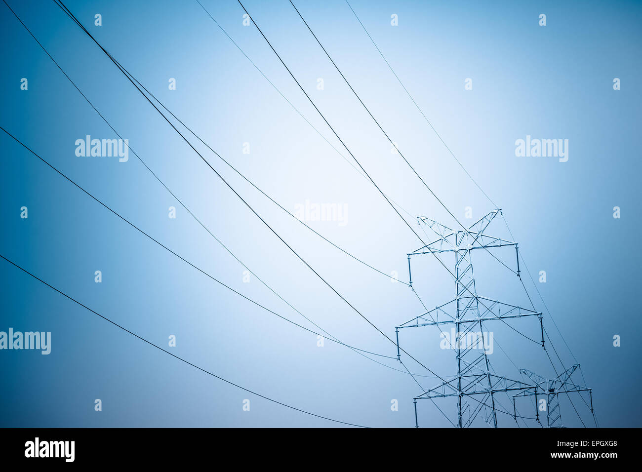 High voltage towers at sunset Stock Photo - Alamy