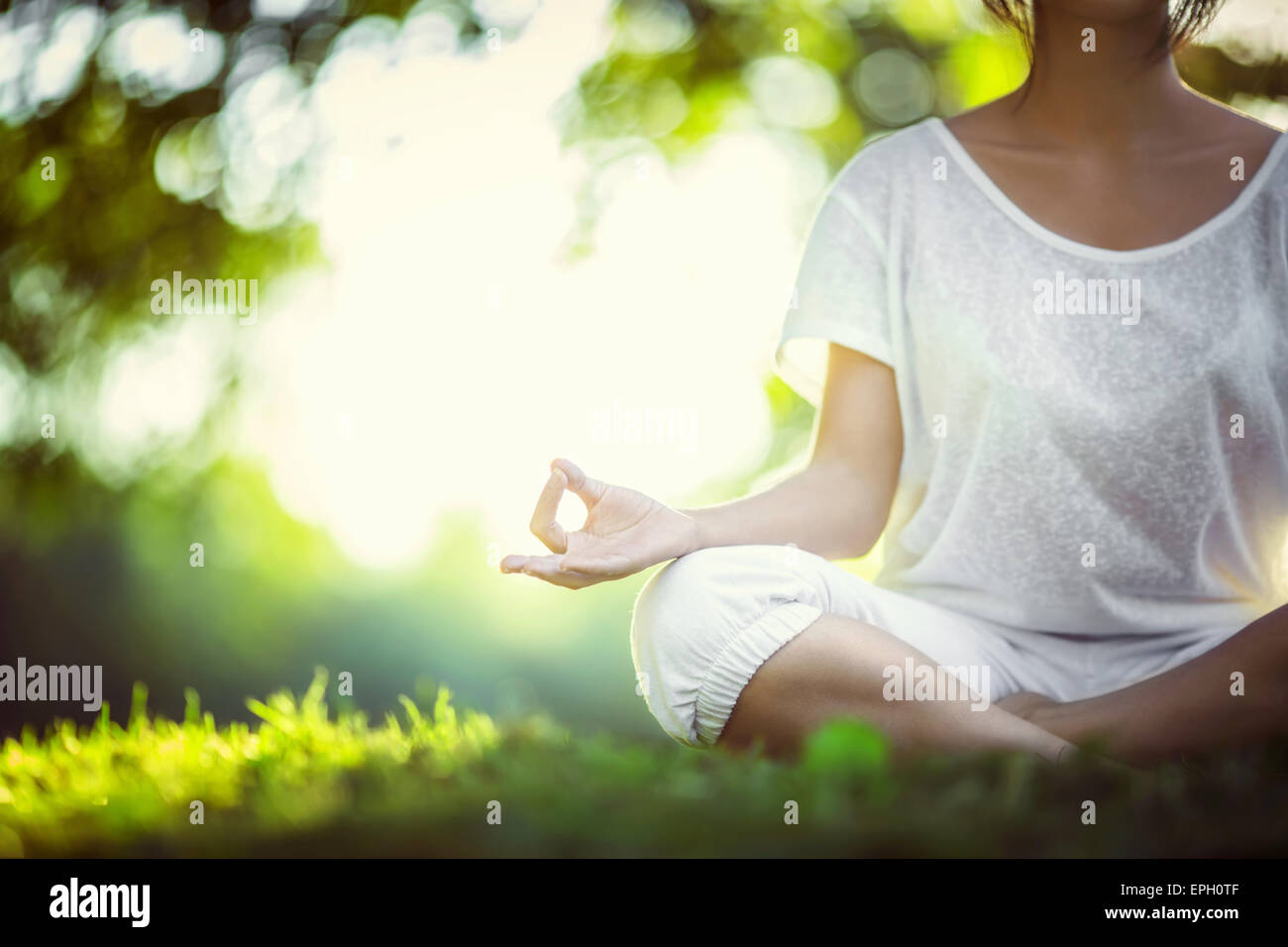 Yoga in the park Stock Photo