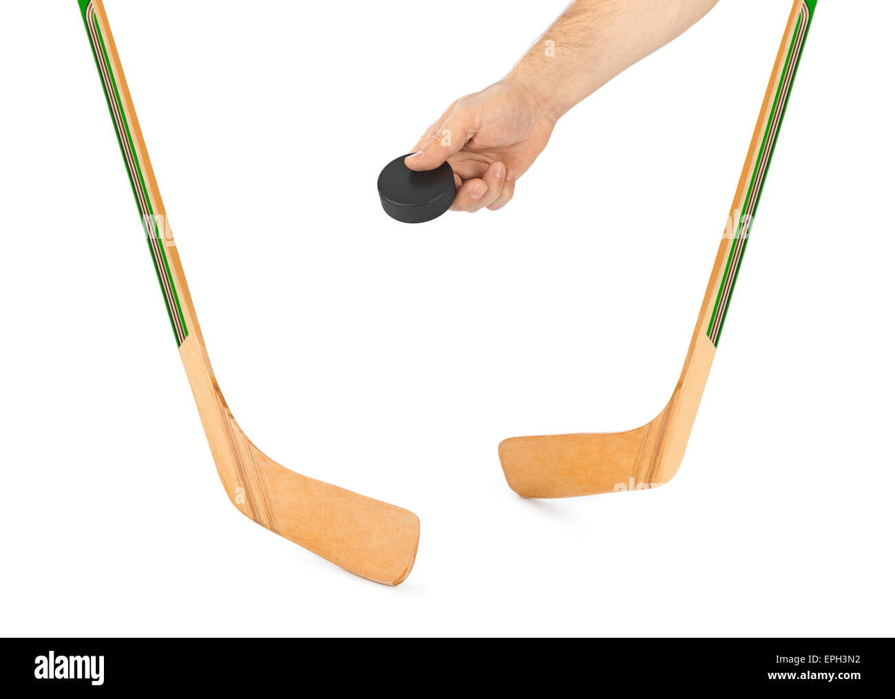 Ice hockey stick and hand with puck Stock Photo Alamy