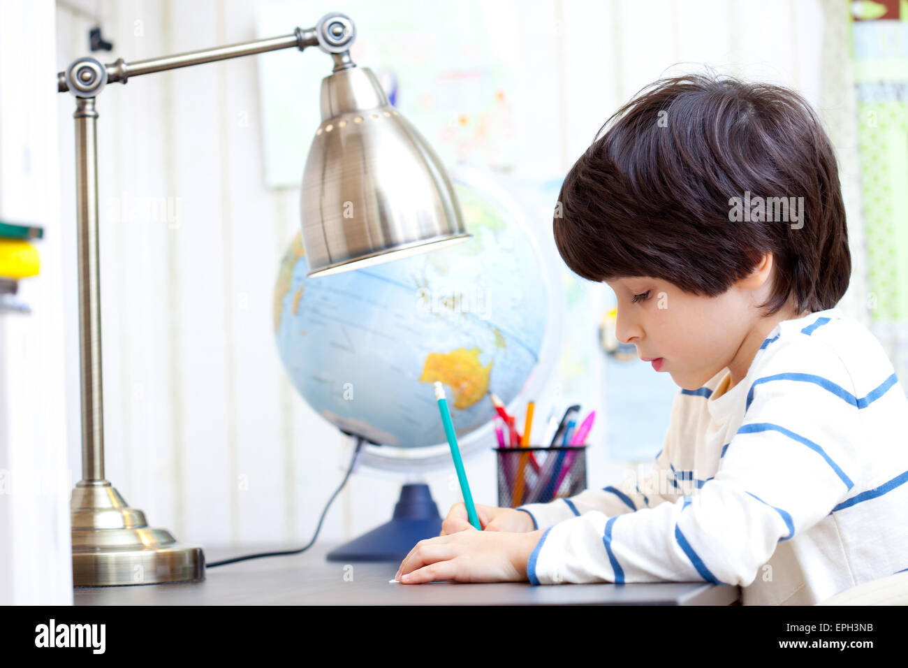 schoolchild doing homework Stock Photo