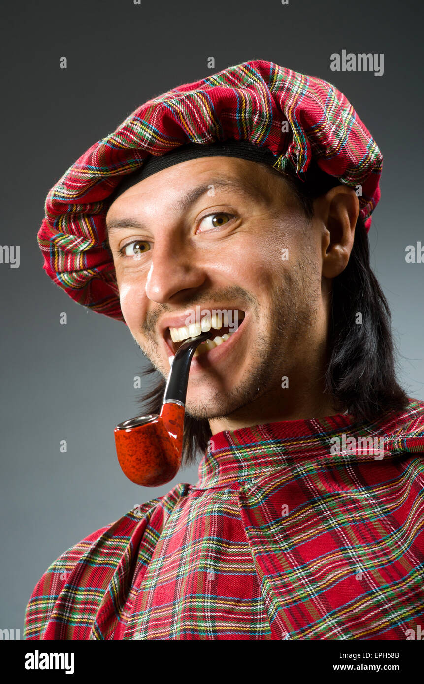 Funny scotsman with smoking pipe Stock Photo Alamy