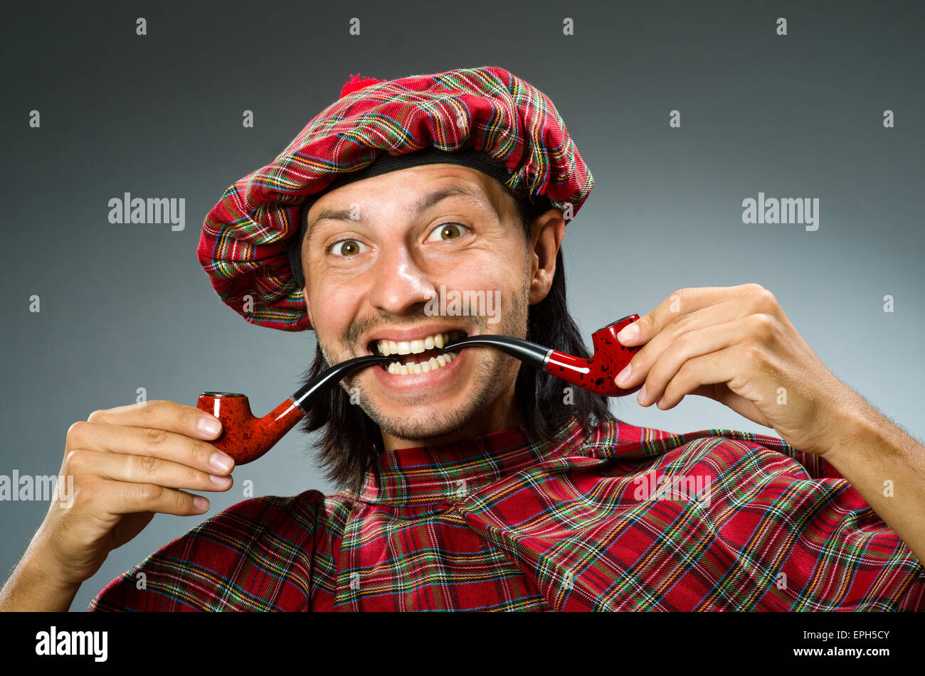 Funny scotsman with smoking pipe Stock Photo Alamy