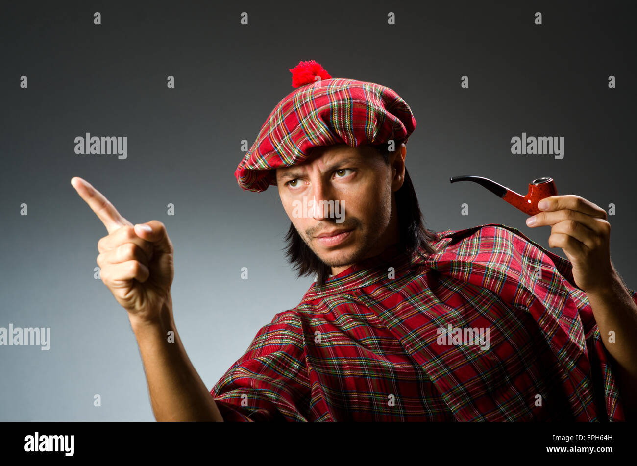 Funny scotsman with smoking pipe Stock Photo Alamy