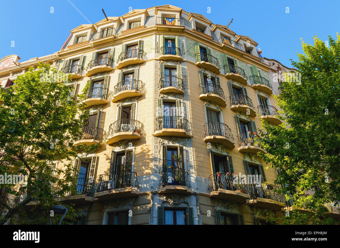Facade of typical residential building in Eixample district, Barcelona ...