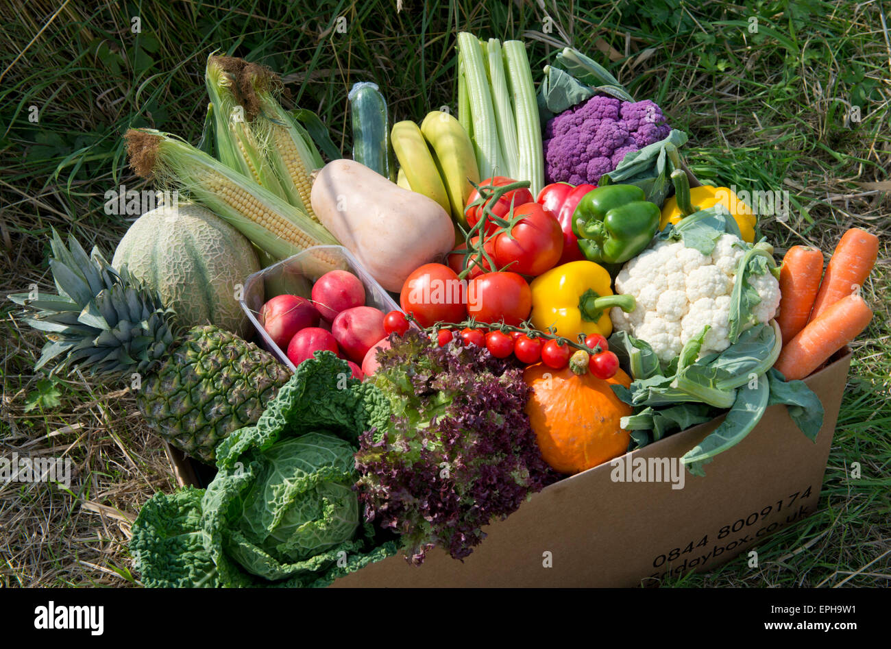 A seasonal veg box including fruit and vegetables ready to be delivered