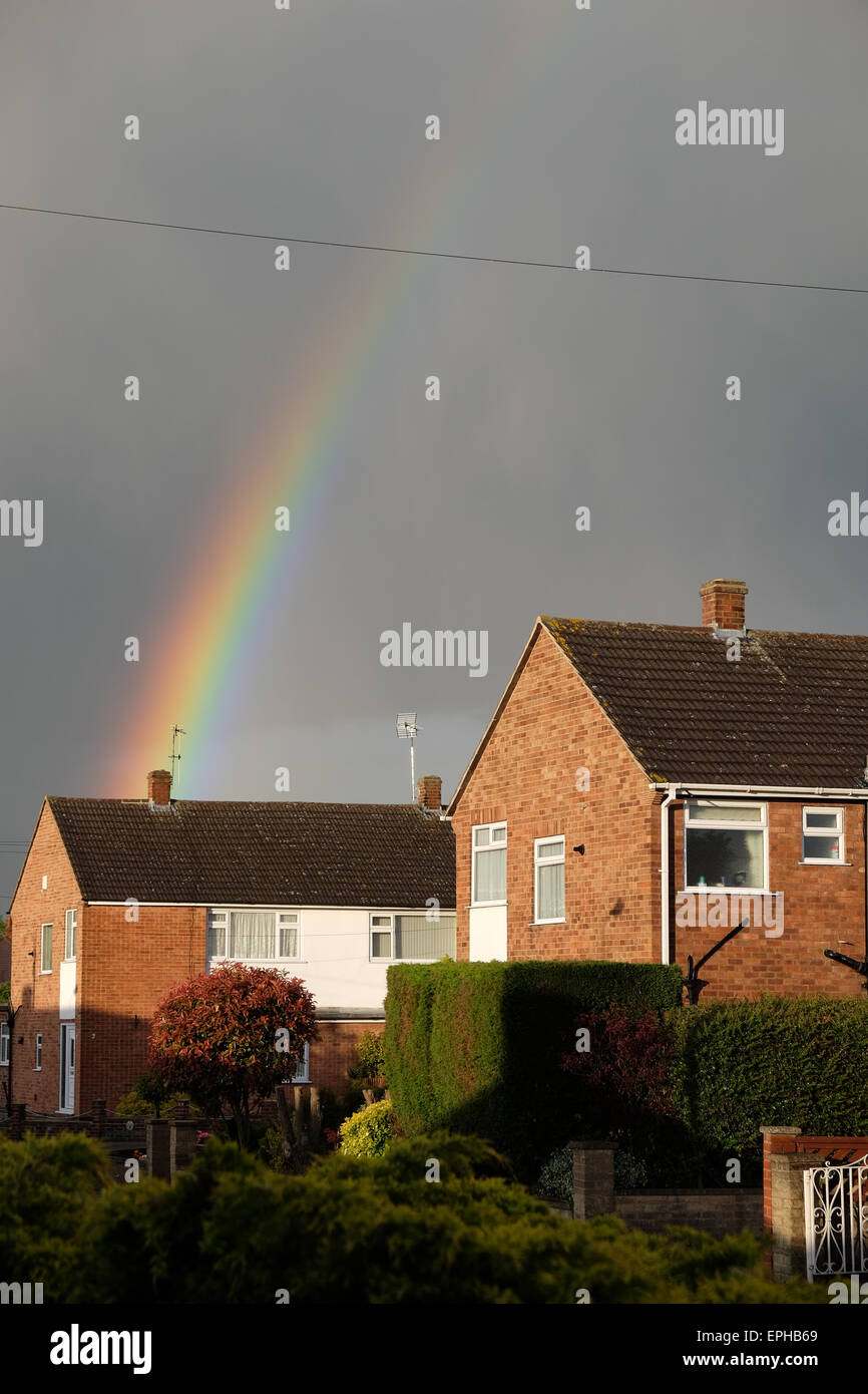 Rainbow appears after a heavy rain shower in loughborough Stock Photo