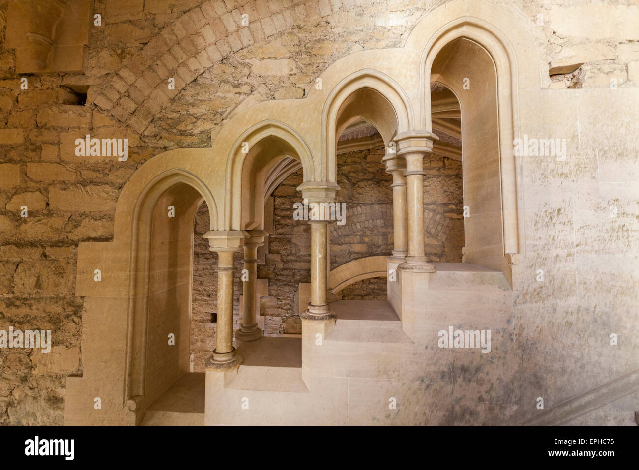 Arched stonework on the Grand staircase at Woodchester mansion, Gloucestershire, England Stock Photo