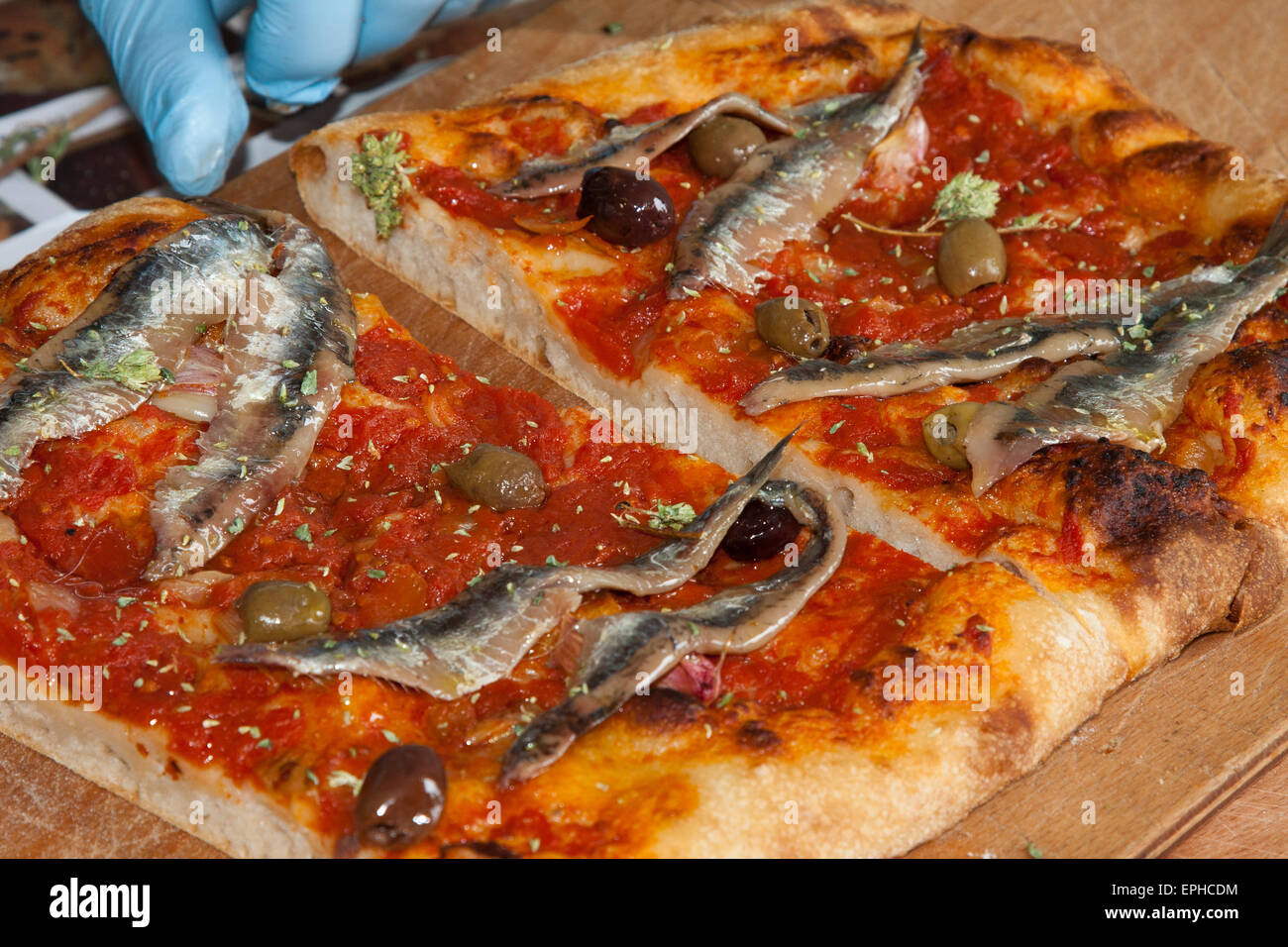 Pizza siciliana (pizza with sardines), Sicily, Italy, Stock Photo