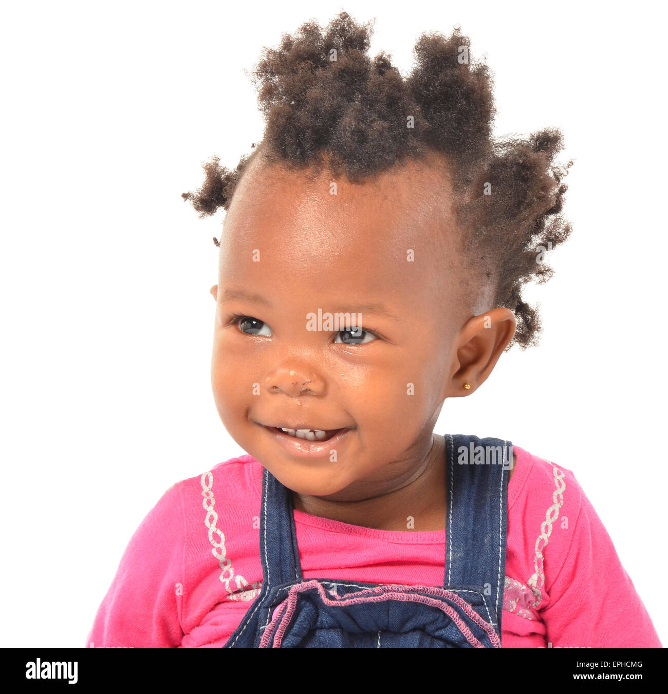 Young African baby girl having fun in photo studio Stock Photo - Alamy
