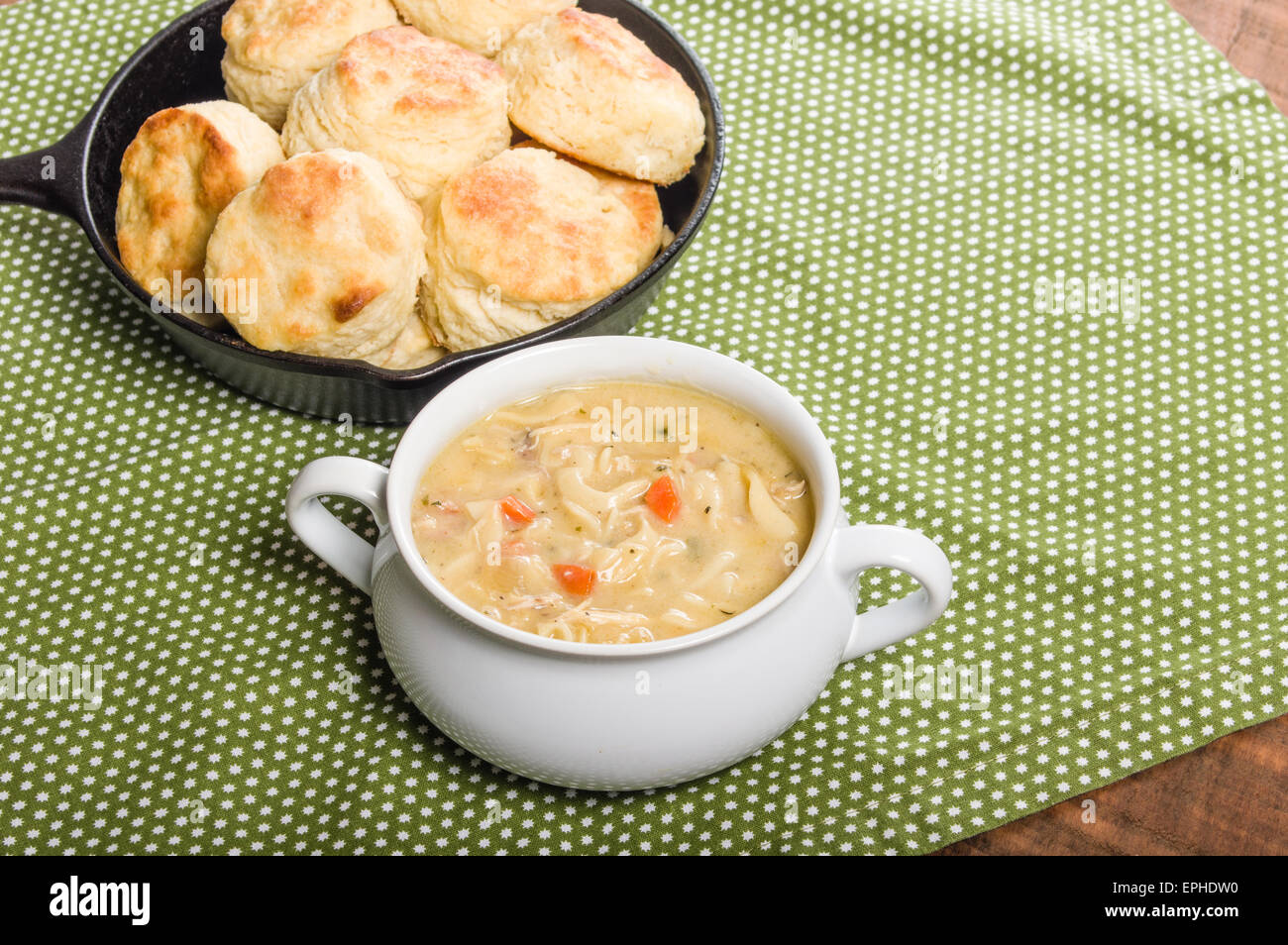 Hot chicken soup with skillet baked biscuits Stock Photo Alamy
