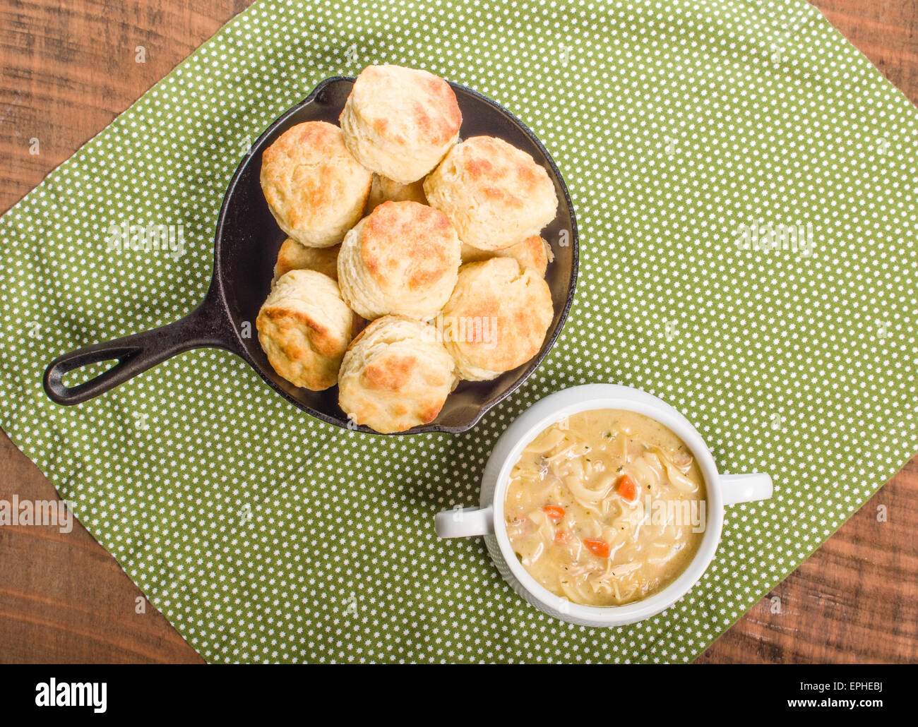 Hot chicken soup with skillet baked biscuits Stock Photo