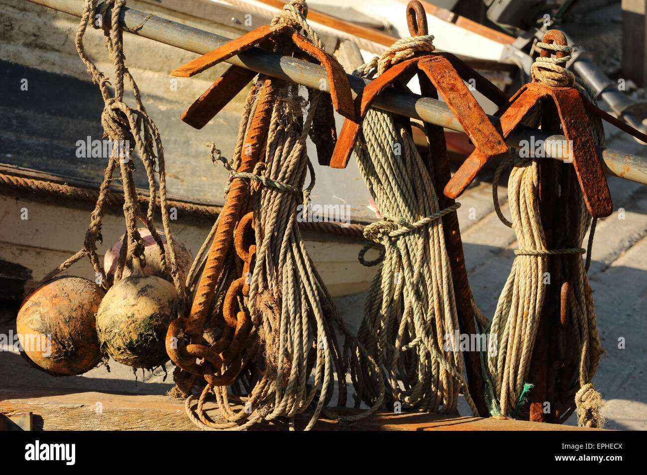 Simple anchors for small fishing boats anchors hires stock photography
