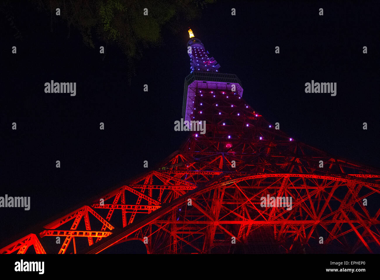 Tokyo Tower illuminated with colorful lights Stock Photo - Alamy