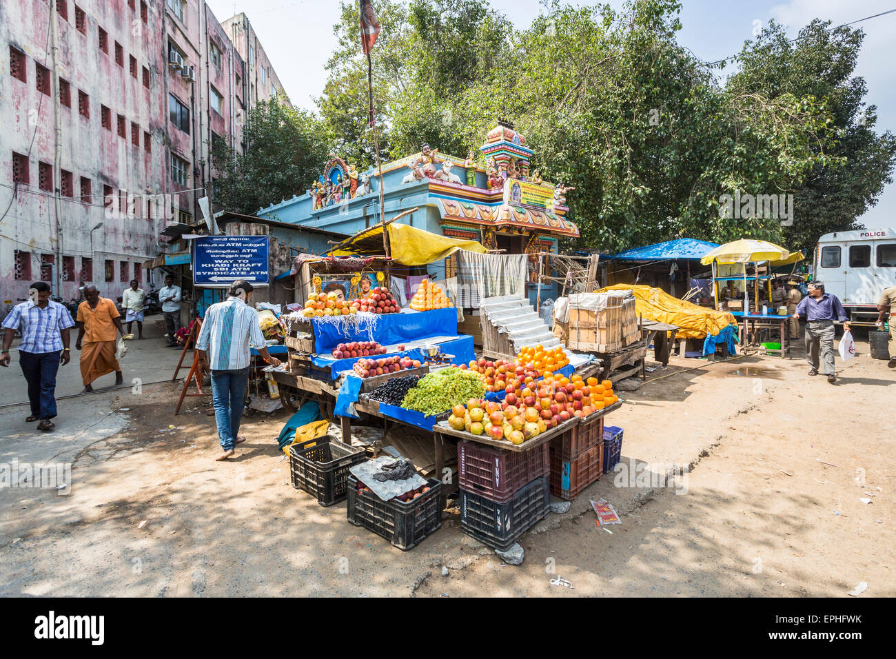 Colourful roadside fruit market trader's stall, typical street scene, Chennai, Tamil Nadu, southern India Stock Photo