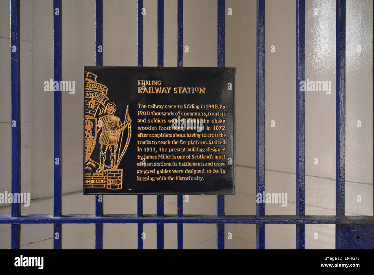 Metal Plaque on the gates at the entrance to Stirling Railway Station Stock Photo