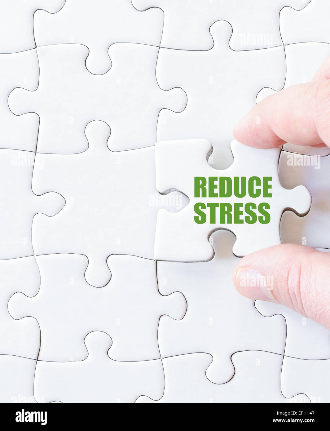 Missing jigsaw puzzle piece with words REDUCE STRESS. Business concept