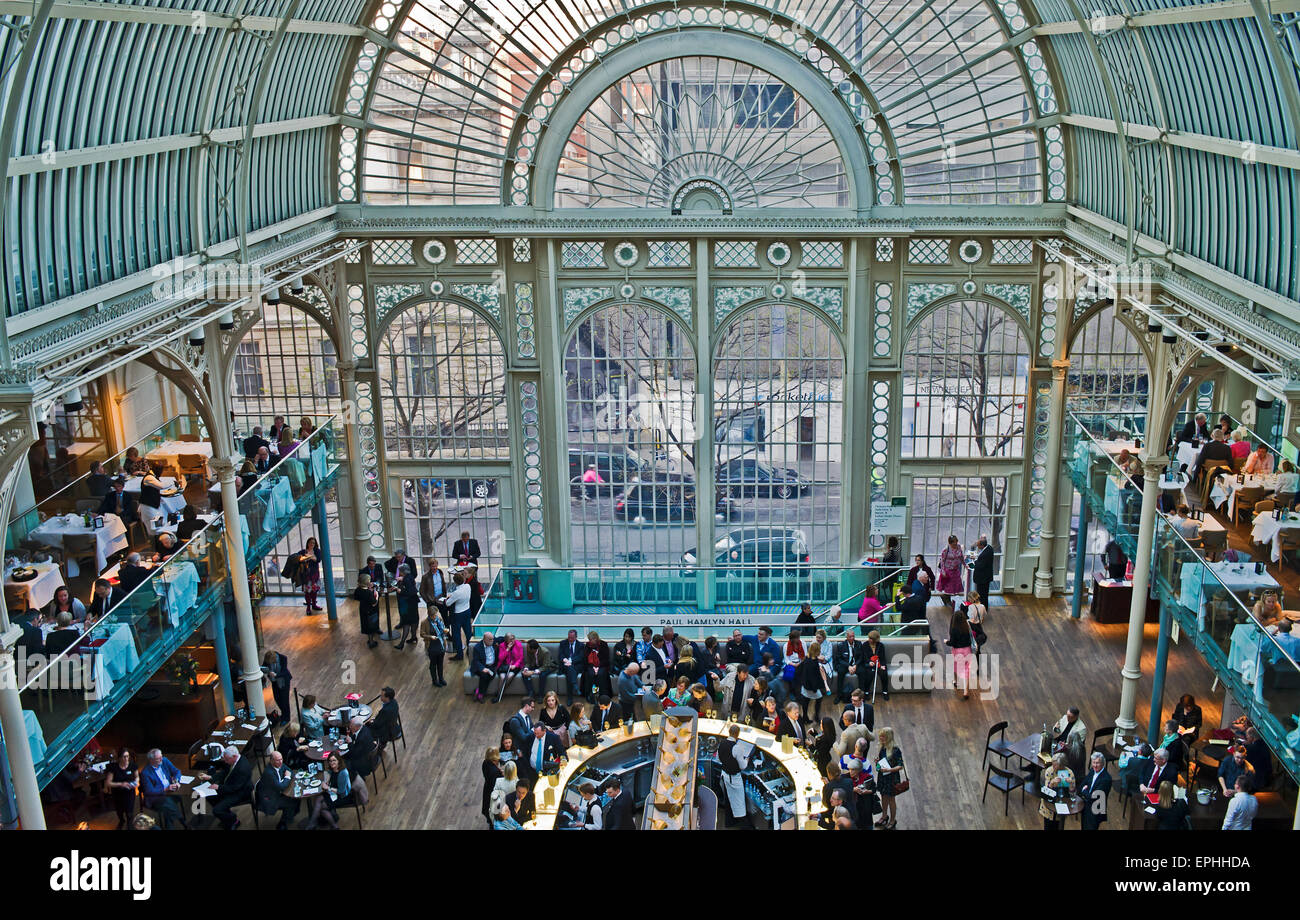 The Paul Hamlyn Hall (old Victorian Floral Hall), Royal Opera House, Covent Garden, London, audience gathers before performance. Stock Photo