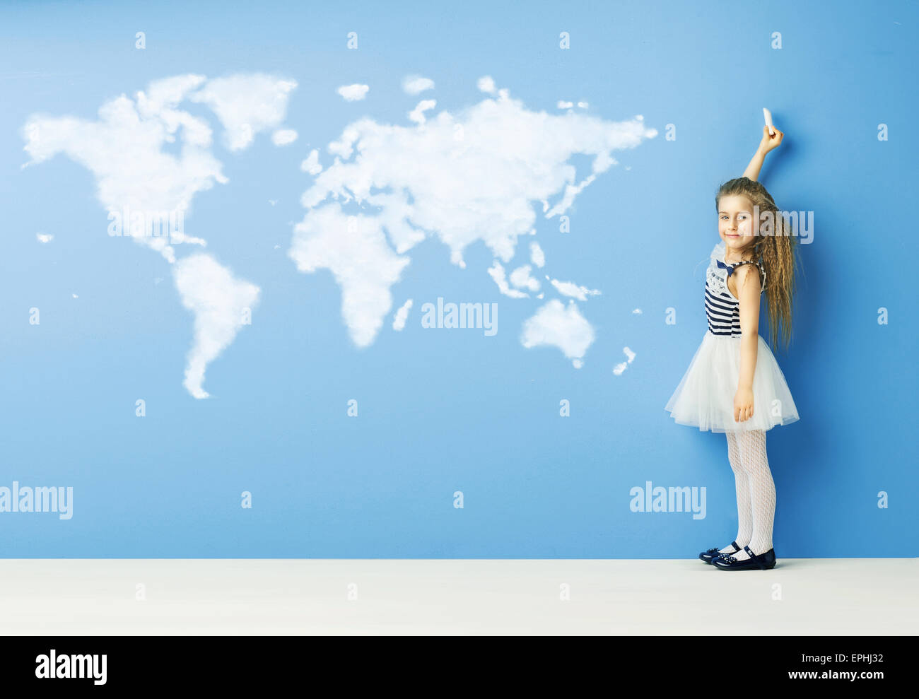 Little child drawing a world map Stock Photo