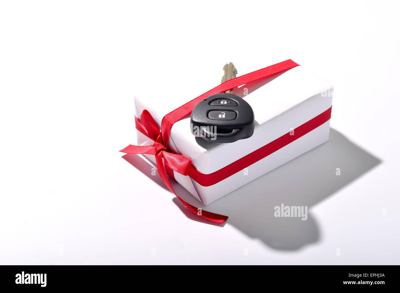 car key and gift box isolated on white background Stock Photo - Alamy