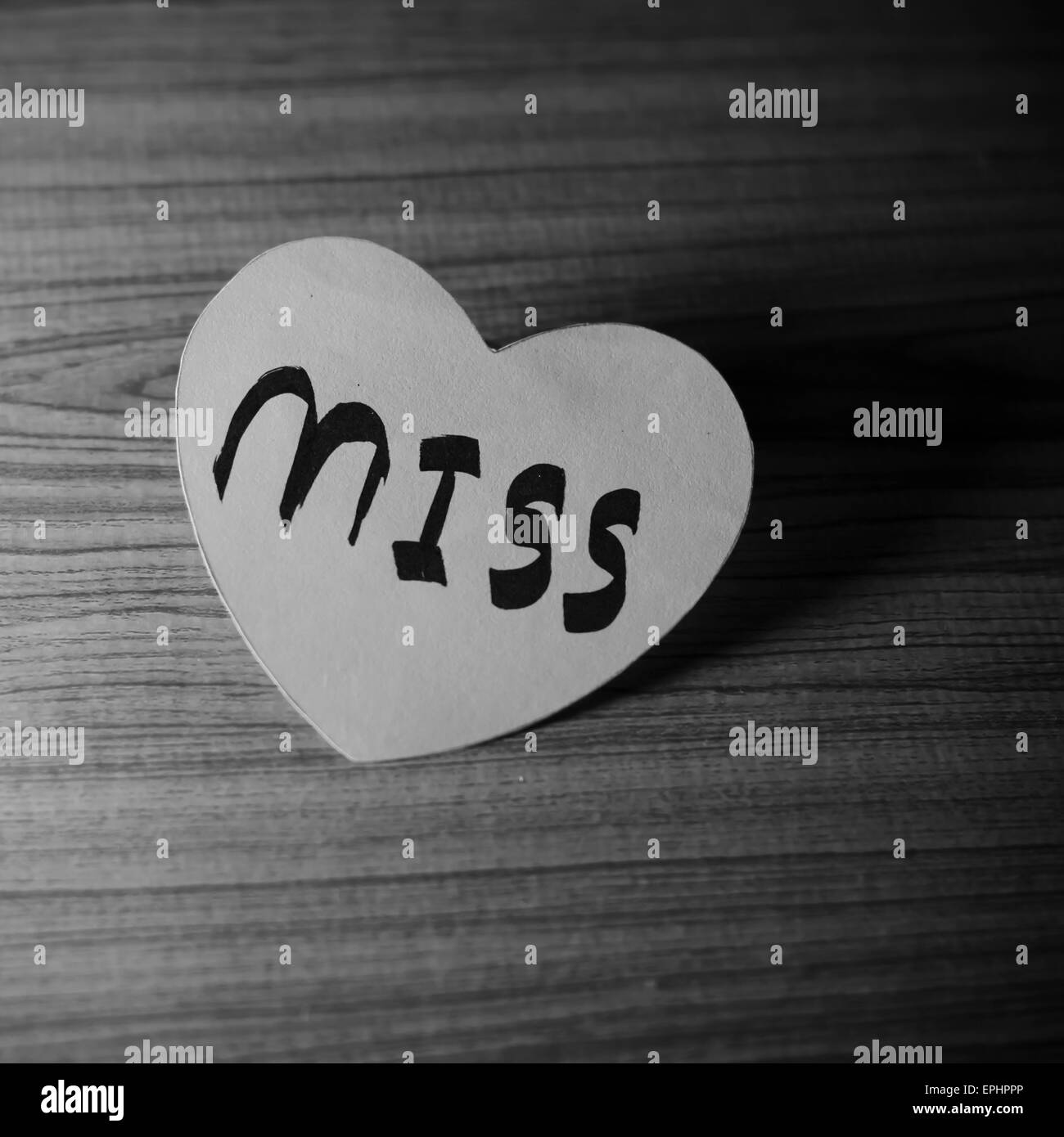 black and white paper heart write miss word Stock Photo - Alamy