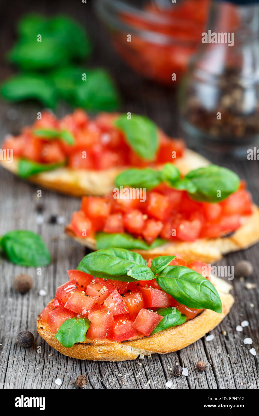 Tomato bruschetta with tomatoes and basil Stock Photo Alamy