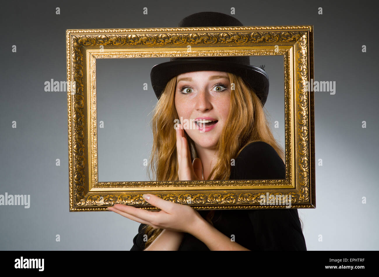 Woman with vintage hat and picture frame Stock Photo - Alamy
