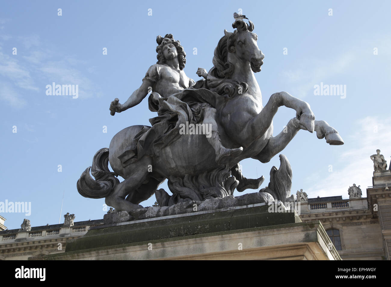 Statue of King Louis XIV at the Louvre museum Paris France Stock Photo