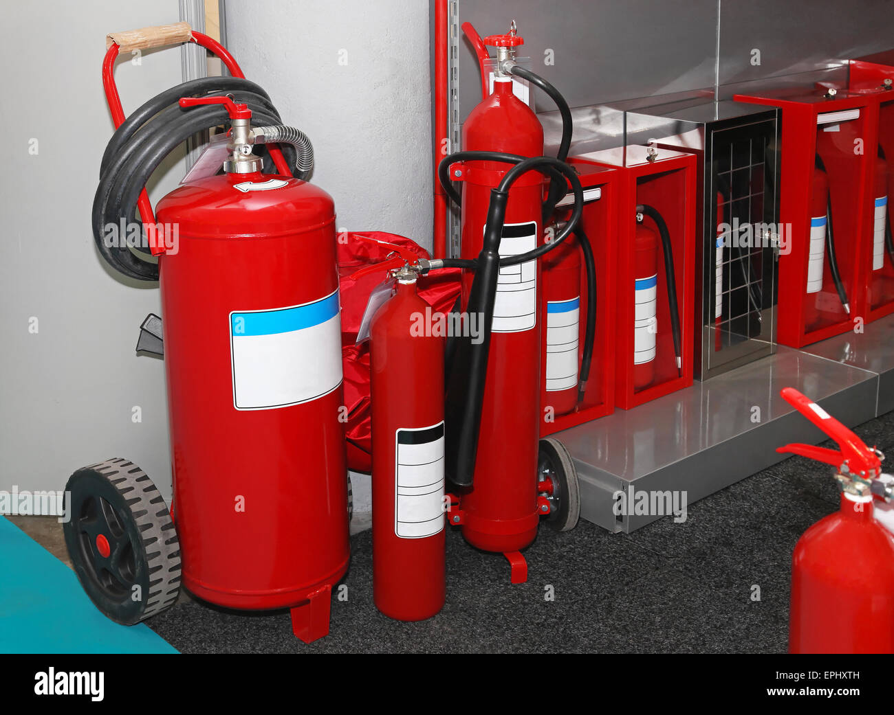 Red fire extinguishers hi-res stock photography and images - Alamy