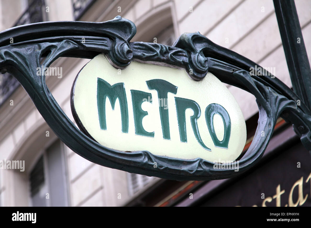 Metro sign by french architect Hector Guimard.Art Nouveau design.Entrance to a metro station in Paris France Stock Photo